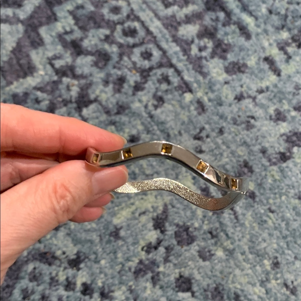 Like new stainless steel bracelet with amber crystals fits 6-7” wrist